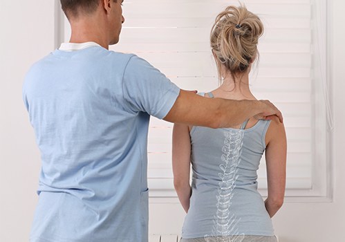 Doctor Wills providing scoliosis treatment