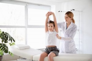 girl working with a chiropractor 